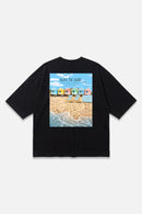 Along The Shore black oversized organic cotton T-shirt, back view – Studio Drop