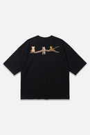 Whimsy Tee black oversized organic cotton T-shirt, back view – Studio Drop