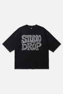 Sketch Logo Tee black oversized organic cotton T-shirt, front view – Studio Drop