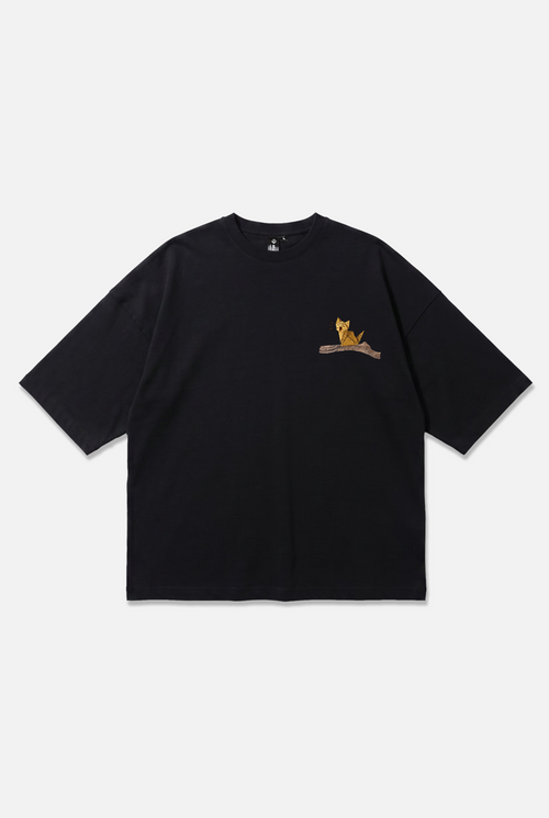 Whimsy Tee black oversized organic cotton T-shirt, front view – Studio Drop
