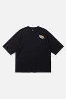 Last Light black oversized organic cotton T-shirt, front view – Studio Drop