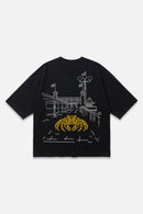 Low Tide black oversized organic cotton T-shirt, back view – Studio Drop