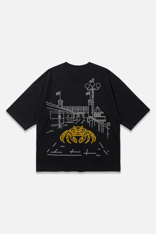 Low Tide black oversized organic cotton T-shirt, back view – Studio Drop