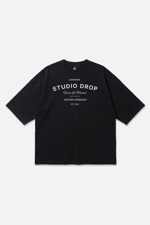 Moment Tee black oversized organic cotton T-shirt, front view – Studio Drop
