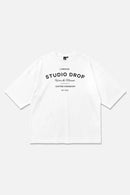 Moment Tee white oversized organic cotton T-shirt, front view – Studio Drop