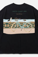 South Coast Ride black oversized organic cotton T-shirt, back view – Studio Drop