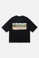 South Coast Ride black oversized organic cotton T-shirt, back view – Studio Drop