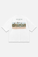 South Coast Ride white oversized organic cotton T-shirt, back view – Studio Drop
