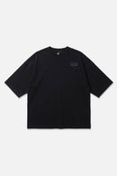 South Coast Ride black oversized organic cotton T-shirt, front view – Studio Drop