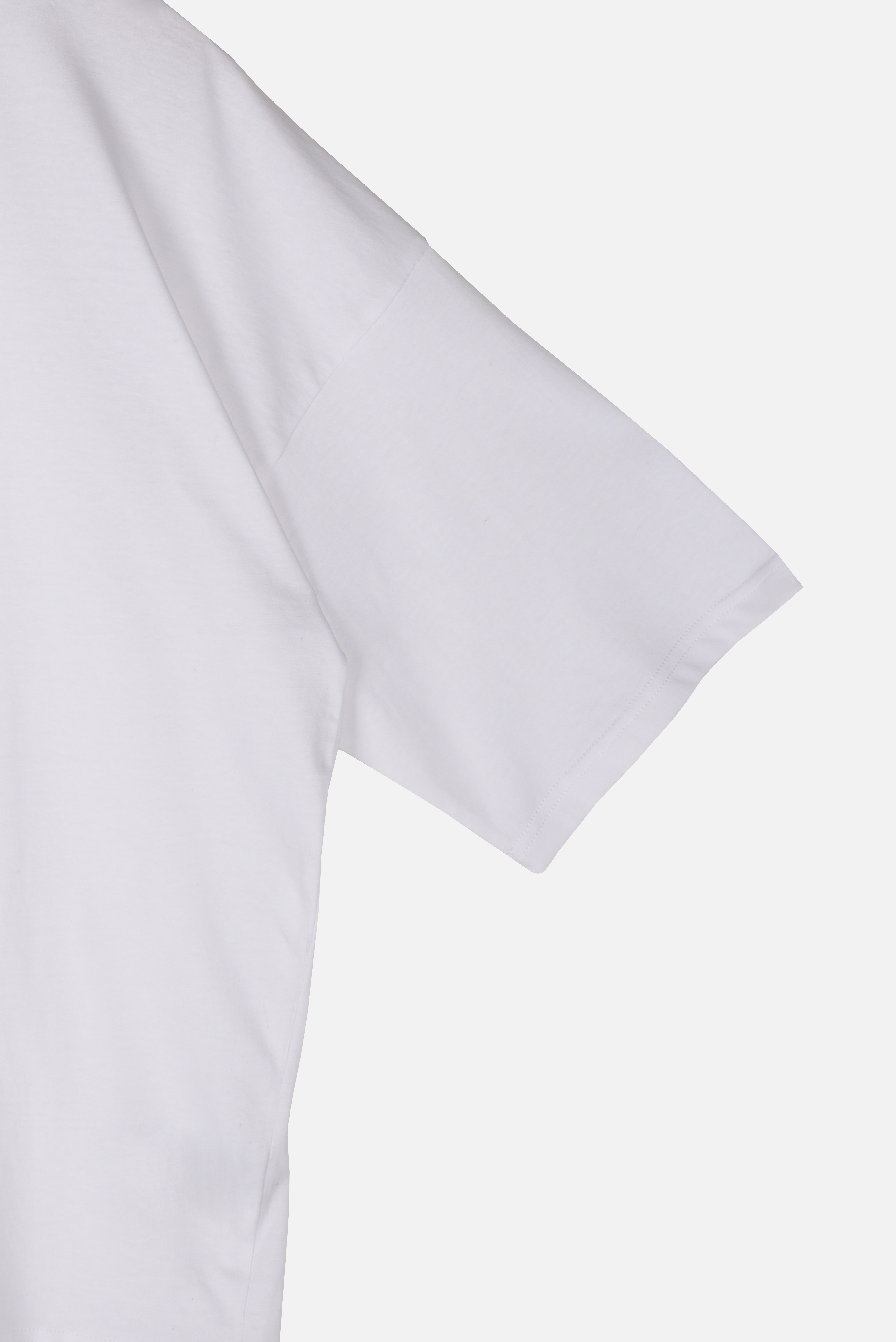 Whimsy Tee white organic cotton T-shirt sleeve and fabric detail – Studio Drop