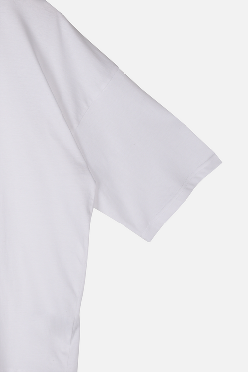 Whimsy Tee white organic cotton T-shirt sleeve and fabric detail – Studio Drop