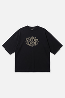 Crosswork Tee black oversized organic cotton T-shirt, front view – Studio Drop