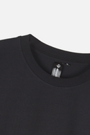 Whimsy Tee black organic cotton T-shirt neckline detail – Studio Drop