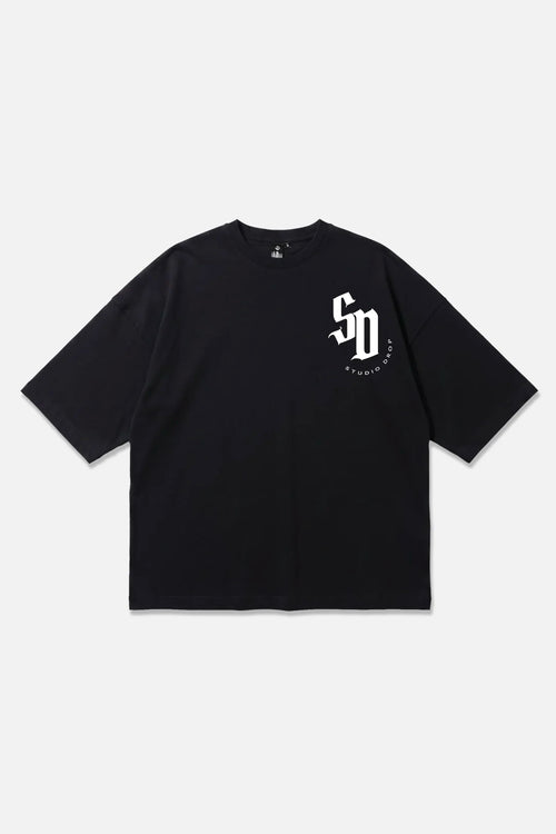 Crest Tee black oversized organic cotton T-shirt, front view – Studio Drop